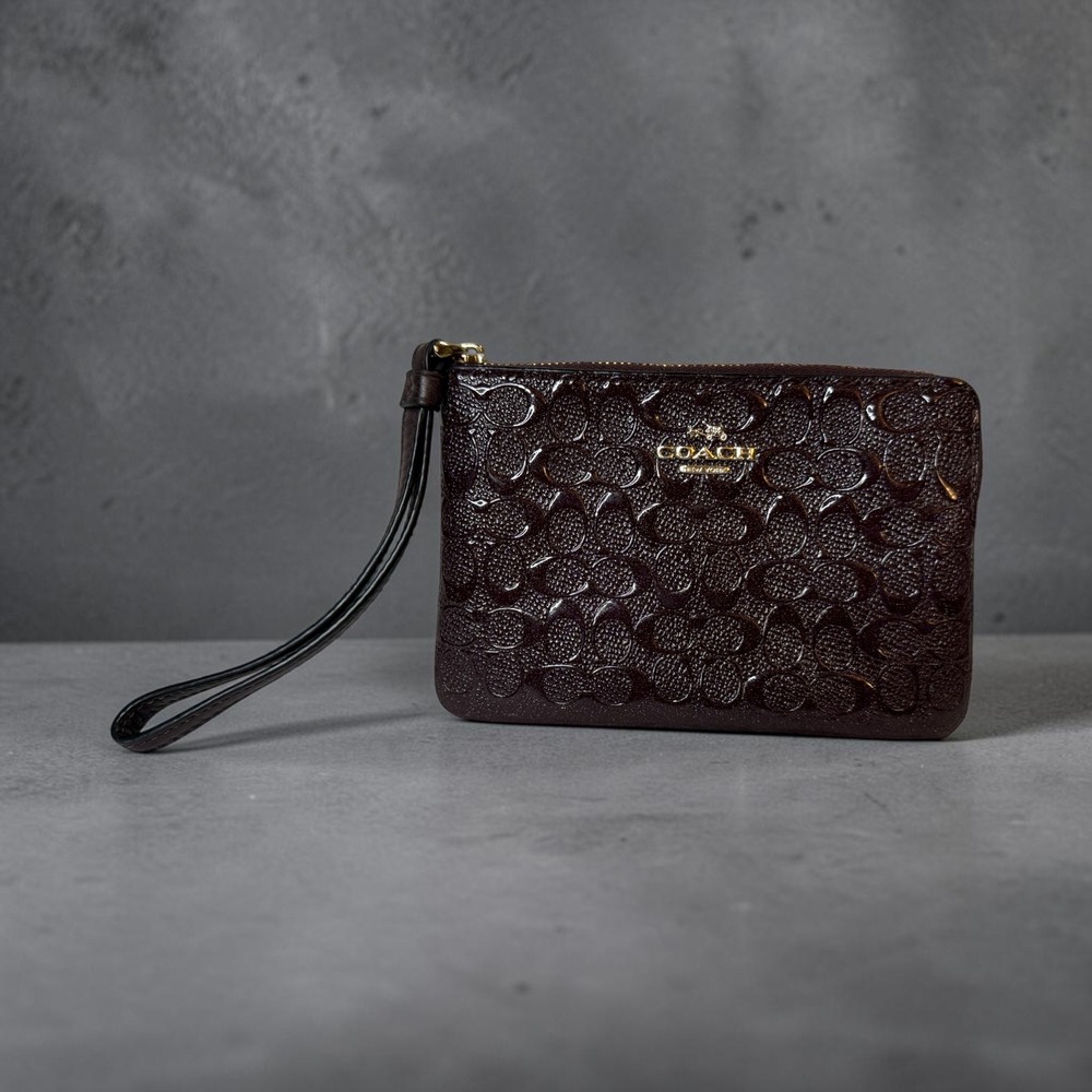 Coach Corner Zip Wristlet Oxblood Patent Signature C Debossed Gold